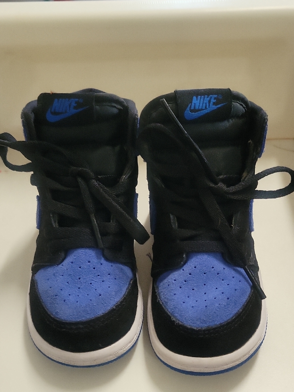Nike Kids High-Top Sneakers in Black and Royal Blue